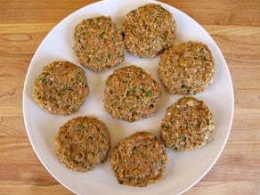 Formed turkey burgers on a plate.
