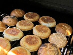 Toasting burger buns on the grill.