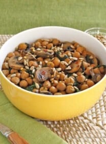 Chickpea, Spinach & Mushroom Sauté - A simple vegan meatless one-pot meal with seared mushrooms, chickpeas, spinach and seasonings, topped with sunflower seeds.