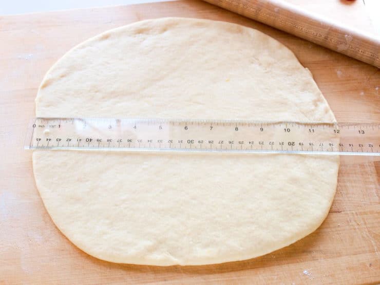 Kolache dough rolled into a circle.