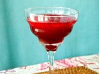 A glass of red pomegranate mocktail