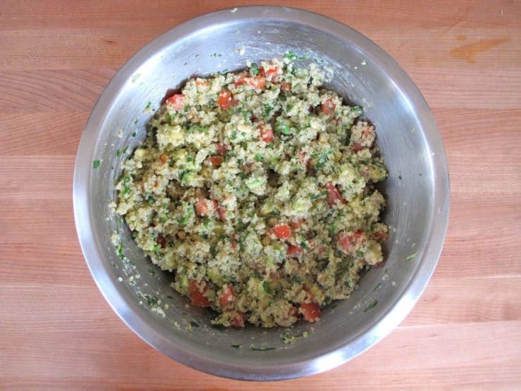 Quinoa and diced vegetables in a bowl.