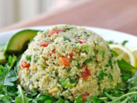 Vibrant salad featuring quinoa, avocado, and tabbouleh, a nutritious and delicious combination