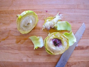 Separating the Heart from a Raw Artichoke - Learn the technique for getting to the heart of raw artichokes, how to clean and prepare them as well as steam them.