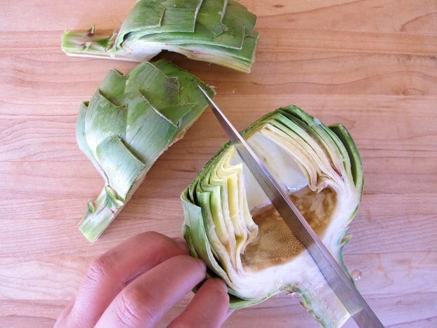 Quartering an artichoke.