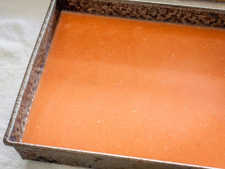 Tomato juice in a baking pan.