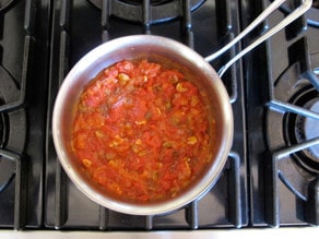 Tomatoes added to skillet.