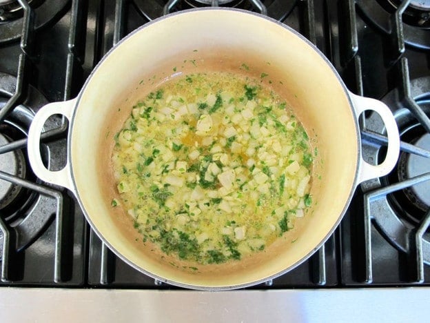 Diced onion in melted butter in a Dutch oven.