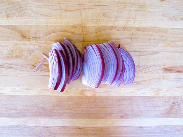 Red onions sliced into thin strips.