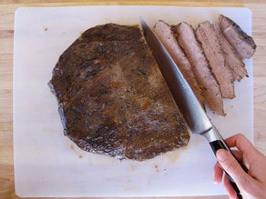 Slicing beef brisket.