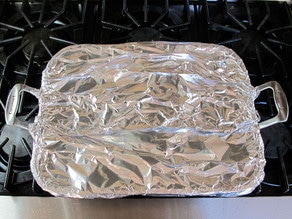 Roasting dish covered with foil.