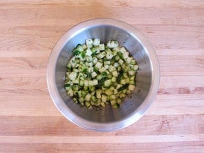 Diced apple salad in a mixing bowl.