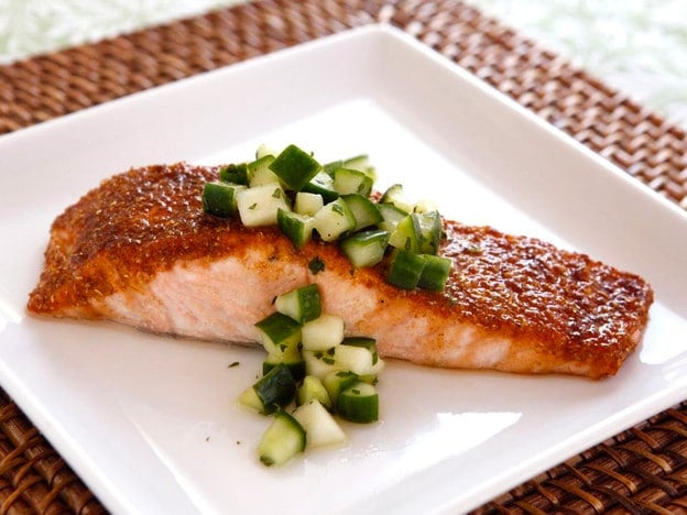 Grilled salmon topped with green apple salad salsa