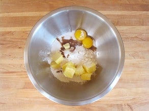 Eggs and flour for crust in a large mixing bowl.