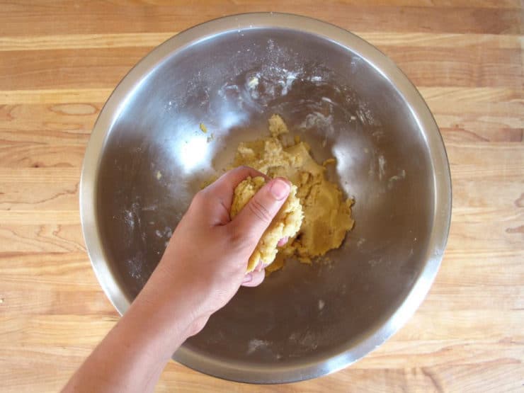 Combine dough ingredients with hands.