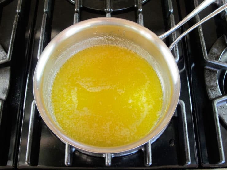 Melted butter in a small pot.