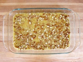 Topping poured over batter in a baking dish.
