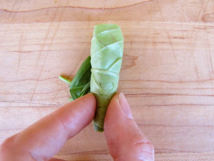 Rolled up basil leaves.