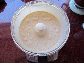 Ricotta and eggs in a food processor.