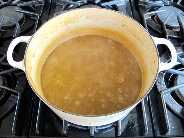 Add cornstarch to stockpot of stew gravy.a