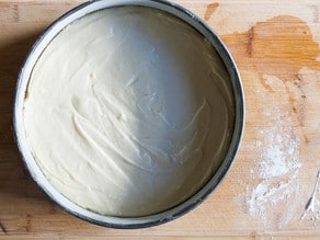 Cake batter in a springform pan.