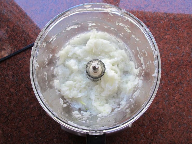 Grated onion in a food processor.