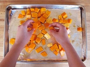 Toss butternut squash to evenly coat.