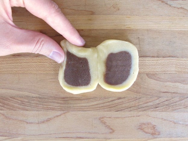 Pinch dough into ear shapes.