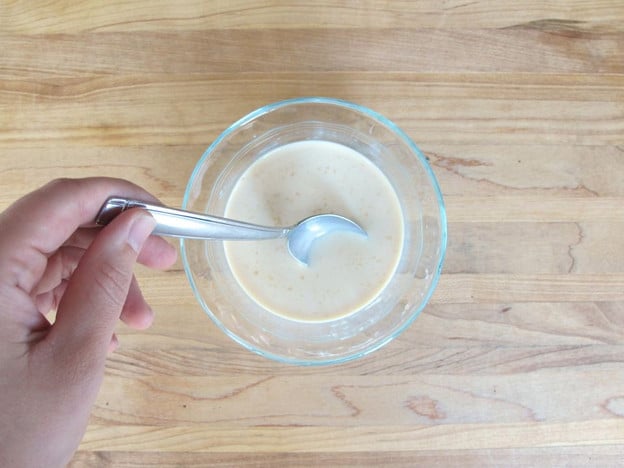 Stir vanilla into milk.