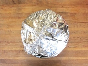 Tent pie with foil before baking.