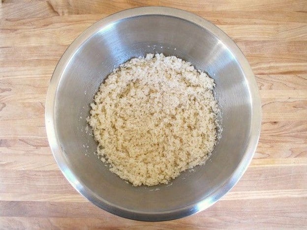 Let eggs and dry ingredients sit in a bowl.