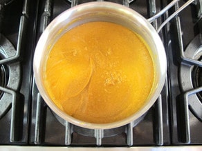 Pumpkin pie filling in a saucepan.