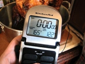 Check the temperature of the turkey as it rests.