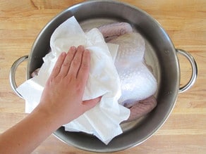Pat turkey completely dry with paper towels.