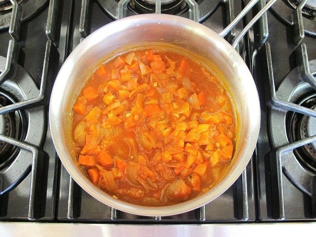 Tomato soup simmering on the stove.