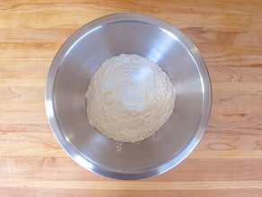 Dry ingredients whisked in a mixing bowl.