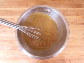 Thoroughly mixing batter in a bowl.