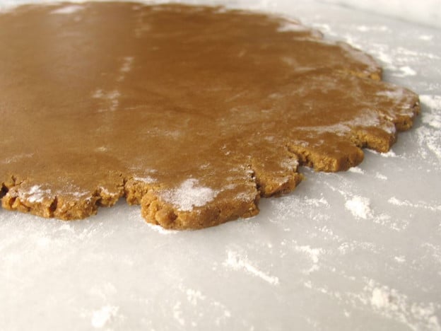 Gingerbread cookie dough rolled out.