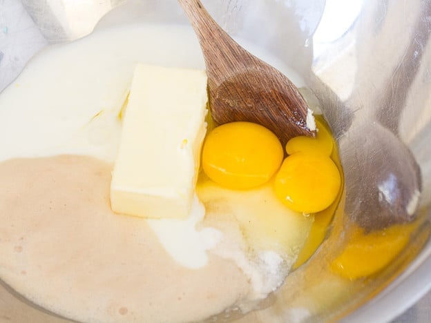 Combining wet dough ingredients.