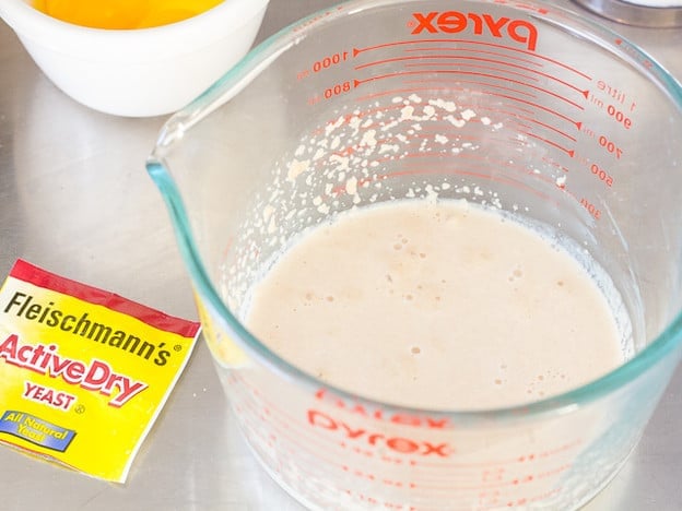 Proofing yeast in warm milk.