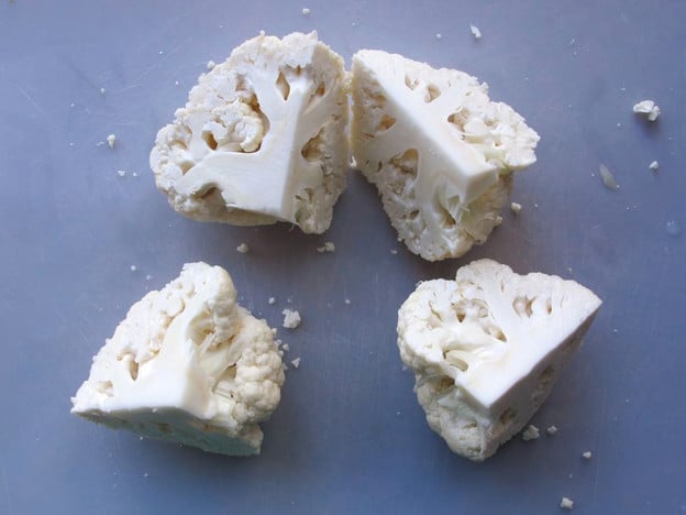 Head of cauliflower quartered.