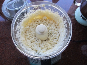 Ricing cauliflower in a food processor.