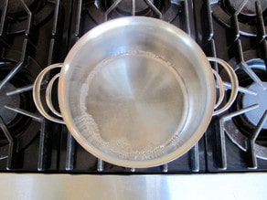Bringing water to a boil on the stovetop.