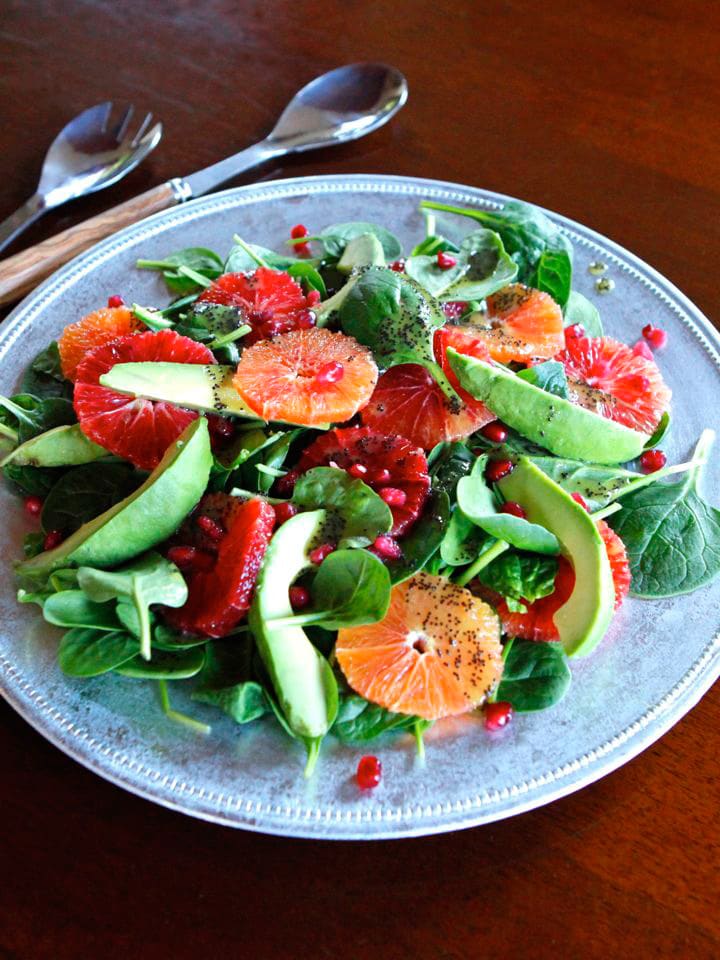 Citrus Avocado Salad with Poppy Seed Dressing - This healthy winter spinach salad recipe with citrus, avocado, pomegranate seeds and poppy seed dressing is nourishing, healthful and seasonal.