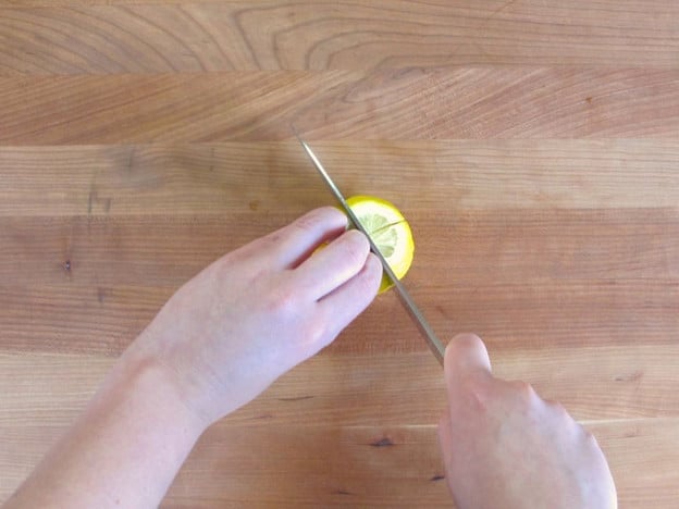 Scoring an X into lemons.
