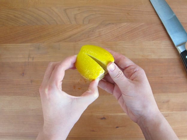 Lemons sliced most of the way through.