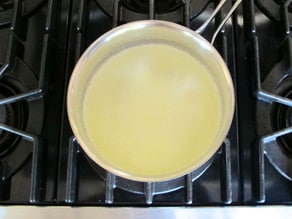 Boiling milk in a saucepan.