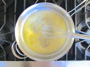 Whisking cornstarch into melted butter.