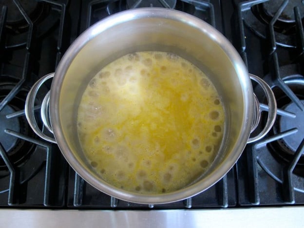 Cooking rice according to package directions.