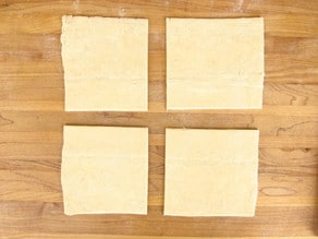 Puff pastry sheet cut into four.